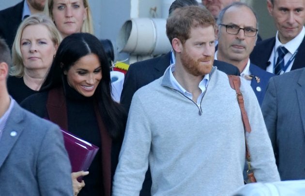 Prince Harry and Meghan Markle arrive at Sydney International Airport in Sydney, New South Wales.