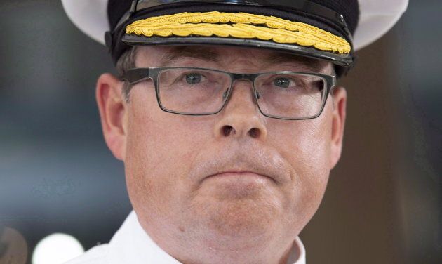 Vice-Admiral Mark Norman speaks with reporters following an appearance at court in Ottawa on Sept. 4, 2018.