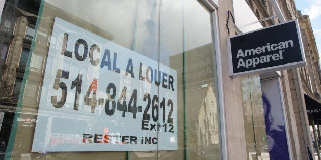 A for-rent sign in the store front window of the American Apparel store in downtown Montreal, Que. on April 18, 2017.