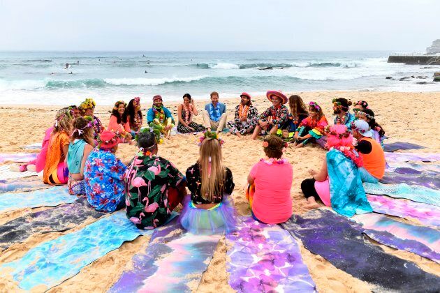 Harry and Meghan join members of OneWave, a local surfing community group who raise awareness for mental health and wellbeing, at Bondi Beach.