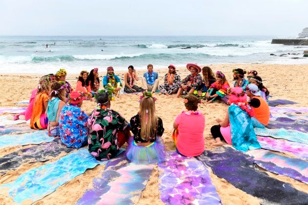 Harry and Meghan join members of OneWave, a local surfing community group who raise awareness for mental health and wellbeing, at Bondi Beach.