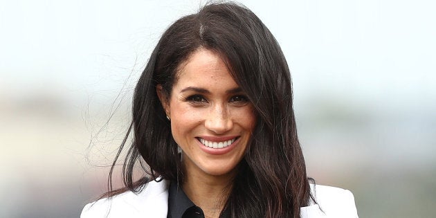 Meghan, Duchess of Sussex, smiles during the JLR Drive Day at Cockatoo Island on Saturday in Sydney, Australia.