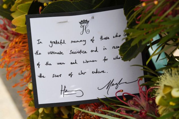 A note attached to the wreath that Harry and Meghan laid.