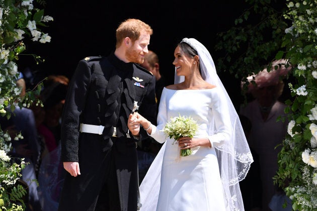 Prince Harry, Duke of Sussex and Meghan Markle, Duchess of Sussex, leave St George's Chapel, Windsor Castle on May 19, 2018 in Windsor, England.