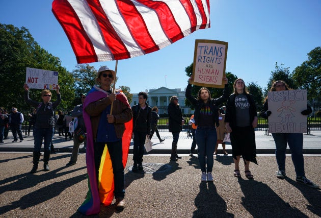The National Center for Transgender Equality, NCTE, and the Human Rights Campaign gather in front of the White House on Monday for a #WontBeErased rally.