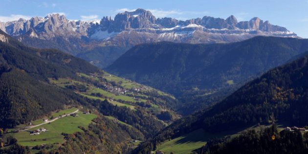 The Rosengarten mountain massif (3,000 meters) in the Dolomites near Bozen, Autonomous Region of South Tyrol, northern Italy's German-Italian speaking region, Sunday, Oct. 21, 2012. (AP Photo/Matthias Schrader)