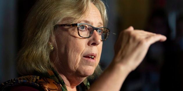 Green Party Leader Elizabeth May speaks with the media in the Foyer of the House of Commons on Parliament Hill in Ottawa on Oct. 23, 2018.