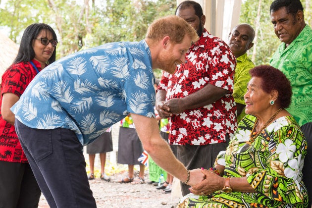 Prince Harry greets Litiana Vulaca.