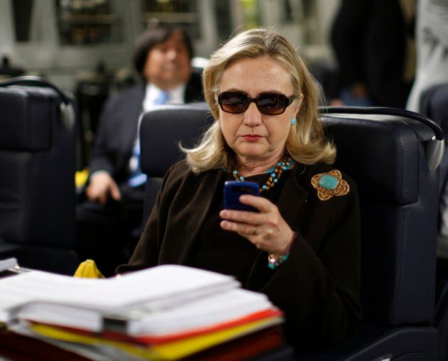 This Oct. 18, 2011 photo of then-Secretary of State Hillary Rodham Clinton checking her Blackberry inspired many, many memes.