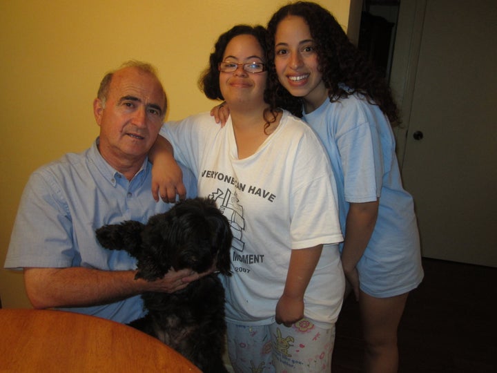 From left to right: father Alfredo, Enrica and younger sister Sabrina in the kitchen on the family home she was raised in.