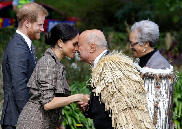 Meghan Markle receives a "hongi," a traditional Maori welcome, on the lawns of Government House in Wellington, New Zealand on Sunday.