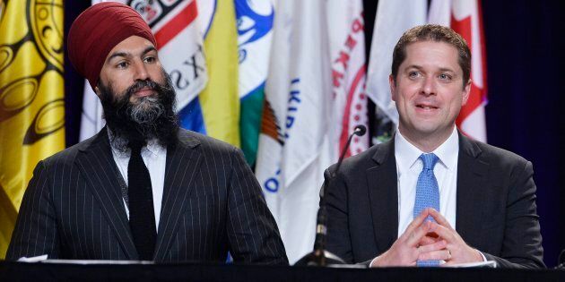 NDP Leader Jagmeet Singh and Conservative Leader Andrew Scheer are shown at the AFN Special Chiefs Assembly in Gatineau, Que., on May 1, 2018.