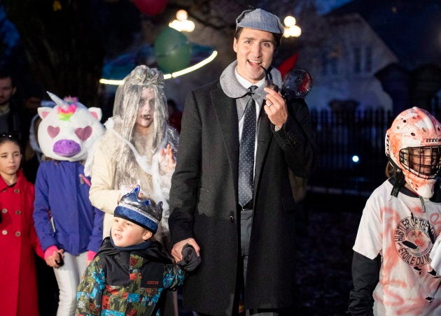 Justin Trudeau trick-or-treating with his son Hadrien at Rideau Hall.