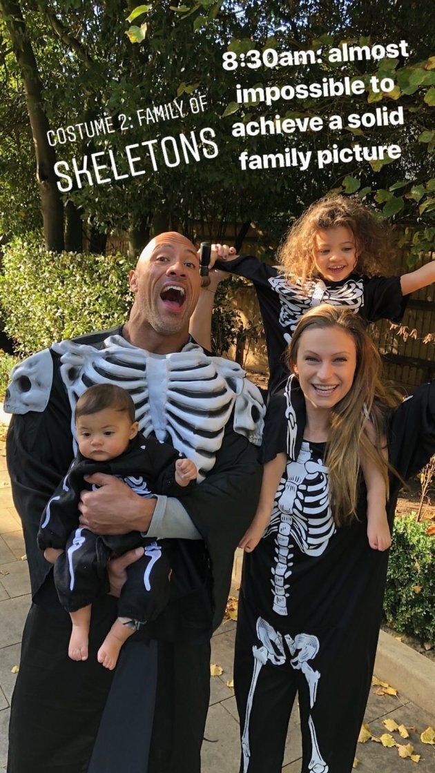 Dwayne Johnson, his partner Lauren Hashian, and their two kiddos.