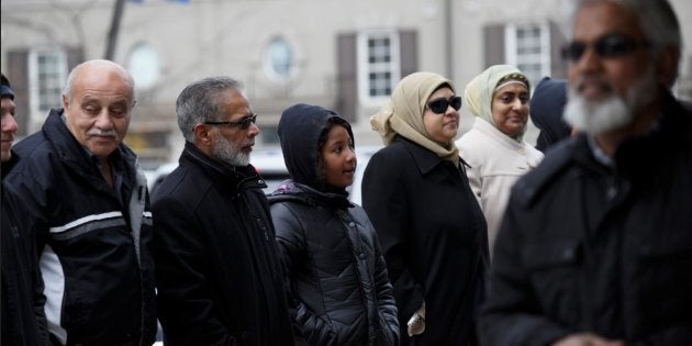 Members of the Islamic Institute of Toronto gather at Beth Sholom in York, Ont. on Nov. 3, 2018.