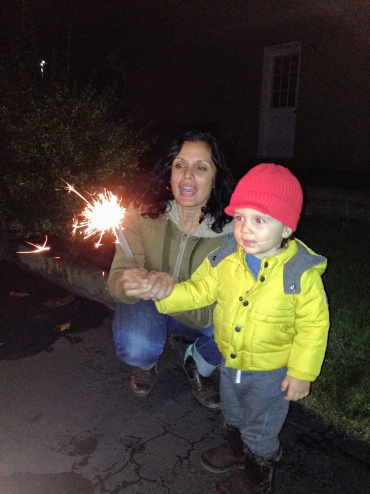 "He was a bit nervous to light the sparkler but ended up loving it," says Henna Patel, who celebrates with her son on his first Diwali.
