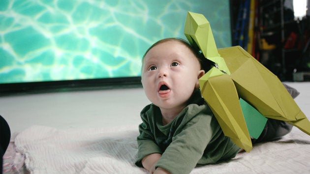 Ava Samson, dressed as an endangered sea turtle, poses for the Canadian Down Syndrome Society's new campaign.