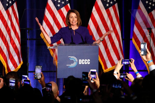 House Minority Leader Nancy Pelosi of Calif., smiles as she is cheered by a crowd of Democratic supporters during an election night returns event on Tuesday, Nov. 6, 2018, in Washington.