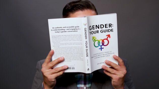 Lee Airton with a copy of "Gender: Your Guide."