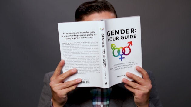 Lee Airton with a copy of "Gender: Your Guide."