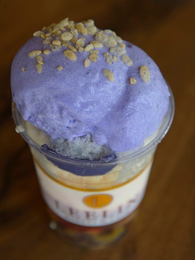 Halo halo is one of the most famous desserts in the Philippines. Its ingredients include white and red beans, gelatin, ube (purple yam) ice cream, flan, shaved ice and coconut.