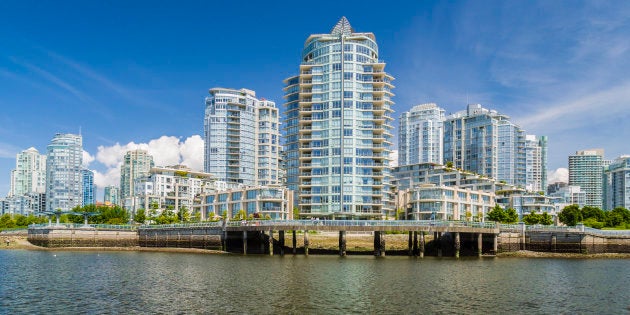 Condo towers overlooking Vancouver's False Creek. Condo prices per square foot in the city centre have soared 40 per cent over the past year, according to a survey from Century 21 Canada.