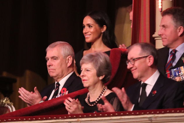 Prince Andrew, Duke of York, Prime Minister Theresa May with husband Philip May, Meghan, Duchess of Sussex and Prince Harry, Duke of Sussex attend the Royal British Legion Festival of Remembrance.