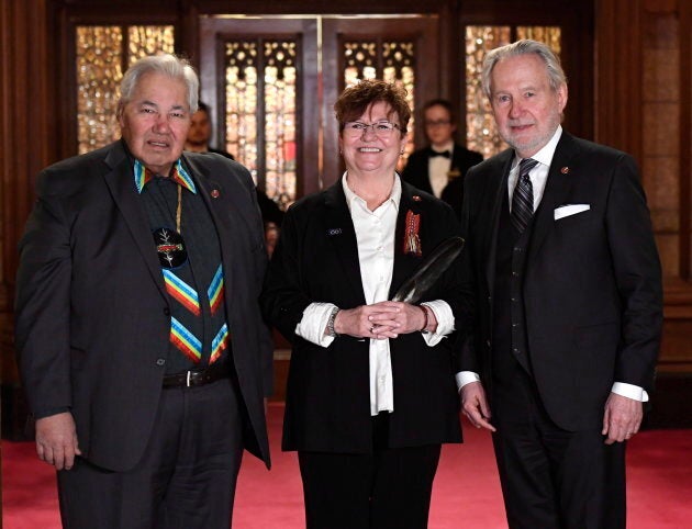 Senator Yvonne Boyer is sworn in as a senator with Murray Sinclair, left, and Peter Harder on March 20, 2018.