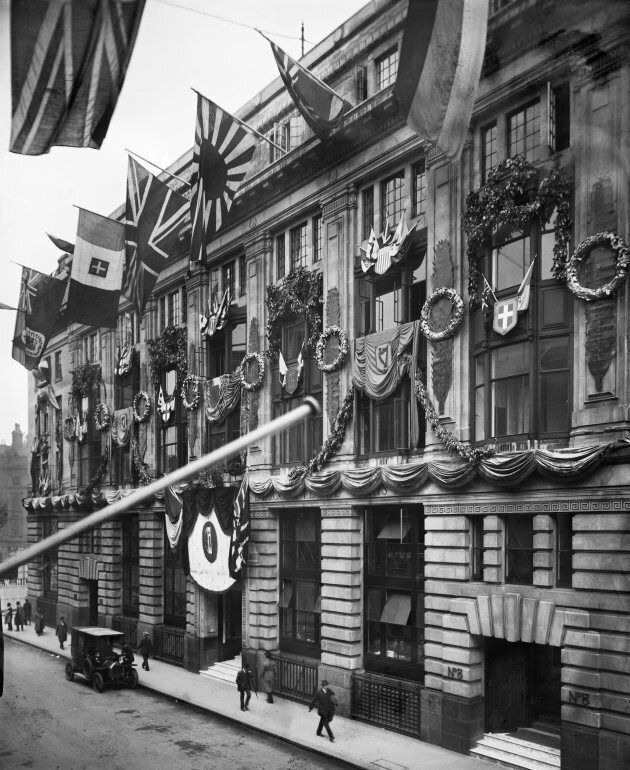 Decorations celebrating the end of the First World War on the front elevation of the Comptoir National d'Escompte de Paris building in London.