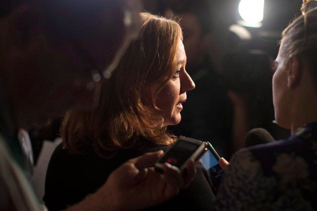 Ontario Minister Lisa Macleod talks with reporters at the Ontario legislature in Toronto on Aug. 2, 2018.