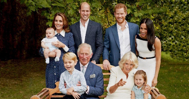 Prince Charles appears to be soaking up grandpa life in this new family portrait.