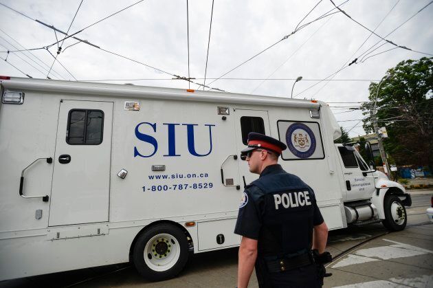 Special investigations Unit truck and Toronto police officer on July 24, 2016.