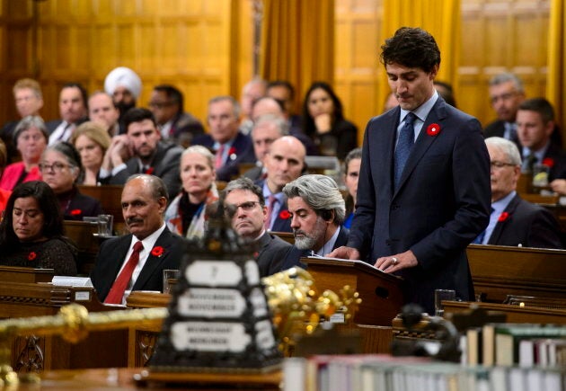 Canadian Prime Minister Justin Trudeau stands to deliver a formal apology on behalf of his nation for the MS St. Louis affair in 1939 in the House of Commons in Ottawa on Nov. 7, 2018.