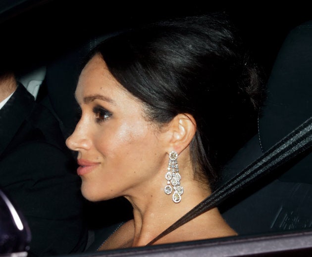 Meghan on her way to her father-in-law's birthday party.