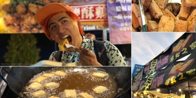 Adam Chen eats stinky tofu at the Waterfront Night Market in Toronto.