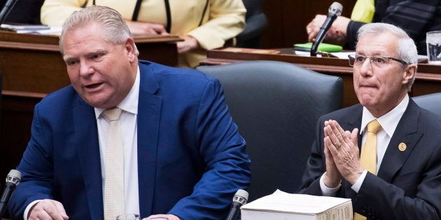 Ontario Premier Doug Ford and Finance Minister Vic Fedeli sit in the legislature before tabling the Fall Economic Statement on Nov. 15, 2018.