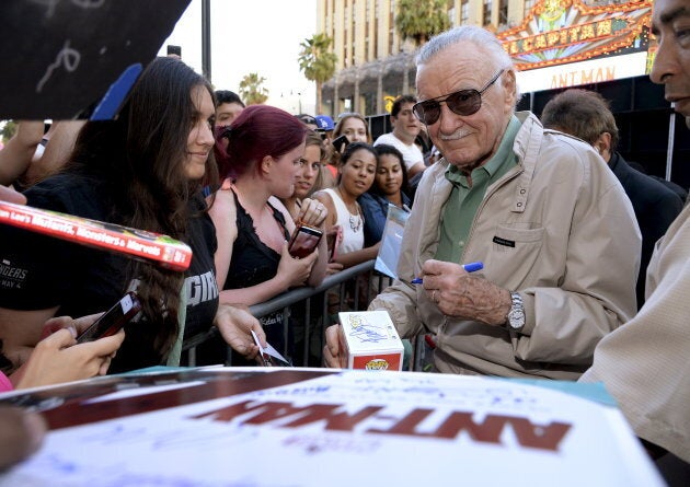 Comic book legend Stan Lee signs autographs to fans at the premiere of Marvel's "Ant-Man" on June 29, 2015.