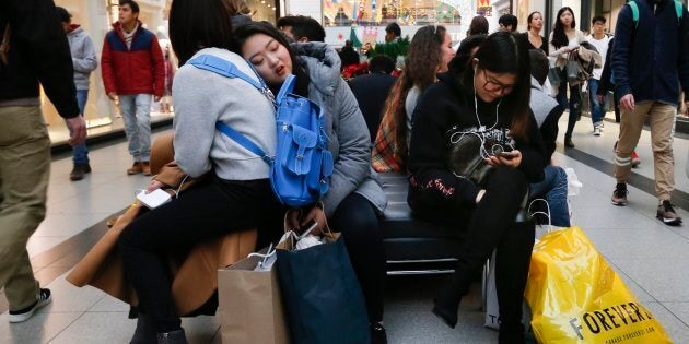 Black Friday shoppers at Toronto's Eaton Centre, Nov. 24, 2017. Canadians are increasingly choosing to shop patriotically amid tense trade relations between Canada and the U.S., a survey from Accenture shows.