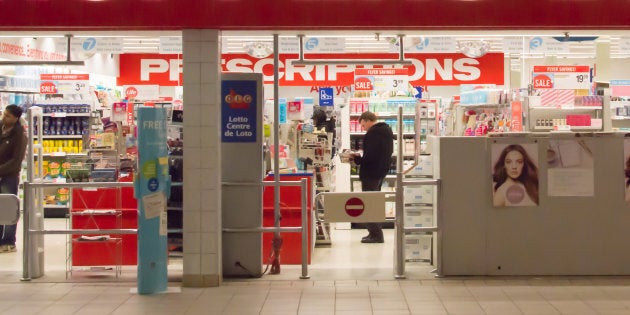 Shoppers browse merchandise at a Shoppers Drug Mart location.