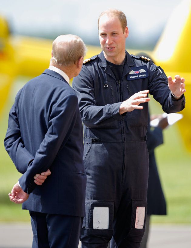 Prince William with his grandfather Prince Philip as he opens the East Anglian Air Ambulance base at Cambridge Airport on July 13, 2016.