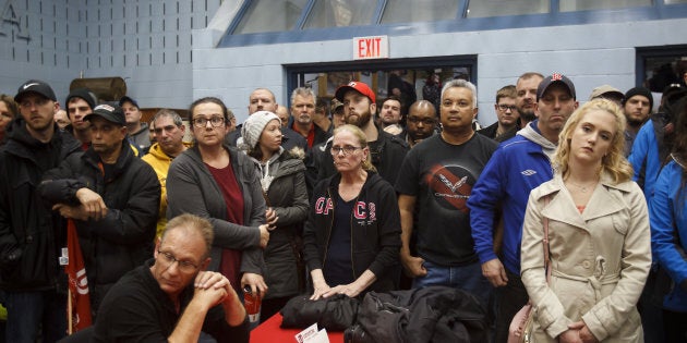 General Motors Co. workers gather for an information meeting at Unifor Union Hall in Oshawa, Ont., Mon. Nov. 26. GM announced on Monday that the Oshawa plant will be