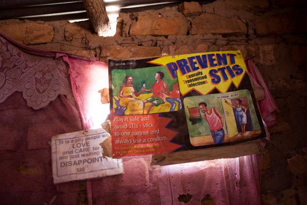 An educational poster advocating safe sex practices (such as sticking to one partner and using condoms) in a town on the border of Zambia and Zimbabwe,