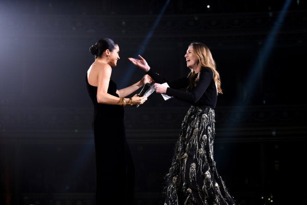 Meghan Markle presents the award for British Designer of the Year to Clare Waight Keller for Givenchy during The Fashion Awards in London on Monday.