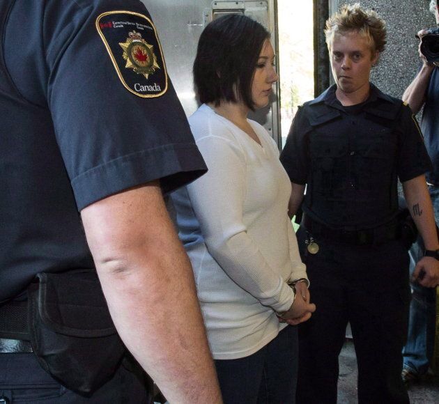 Terri-Lynne McClintic is escorted into court in Kitchener, Ont., on Sept. 12, 2012 for a trial in an assault on another inmate while in prison.