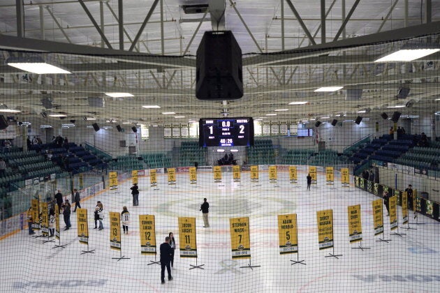 Sixteen banners in honour of the lives taken in the Humboldt Broncos bus crash in April are shown in the foreground and the banners for the survivors sit in the background during a tribute to the team in Humboldt , Sask., on Sept. 12, 2018.