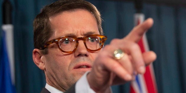 Standing Committee on Access to Information, Privacy and Ethics Chair Bob Zimmer gestures to a reporter during a news conference in Ottawa on Dec. 11, 2018.