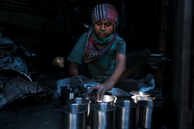 A child worker works in a utensil factory in Dhaka, Bangladesh on Nov. 25, 2018.