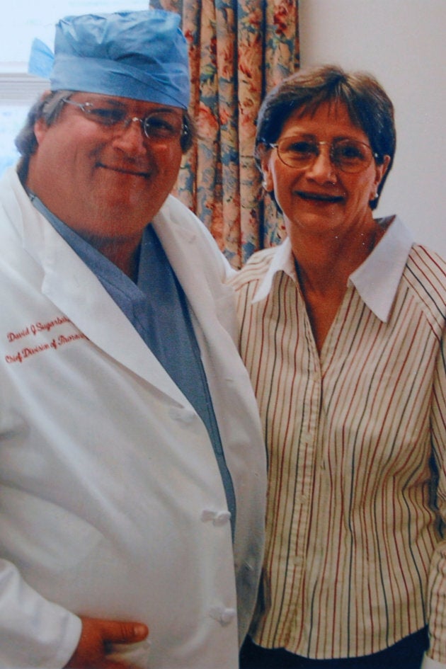 Darlene Coker is shown with her thoracic surgeon David Sugarbaker in this undated handout family photograph.