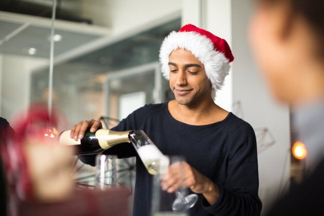 You too can host a party with all the coolness and confidence of this Santa hat-wearing man.