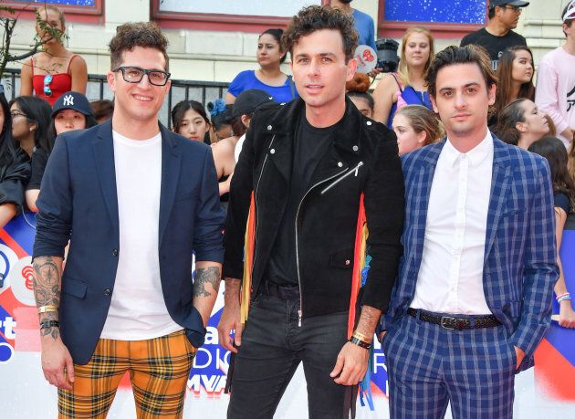 Anthony Carone, Max Kerman and Mike DeAngelis of the Arkells arrive at the 2018 iHeartRADIO MuchMusic Video Awards on August 26, 2018 in Toronto,